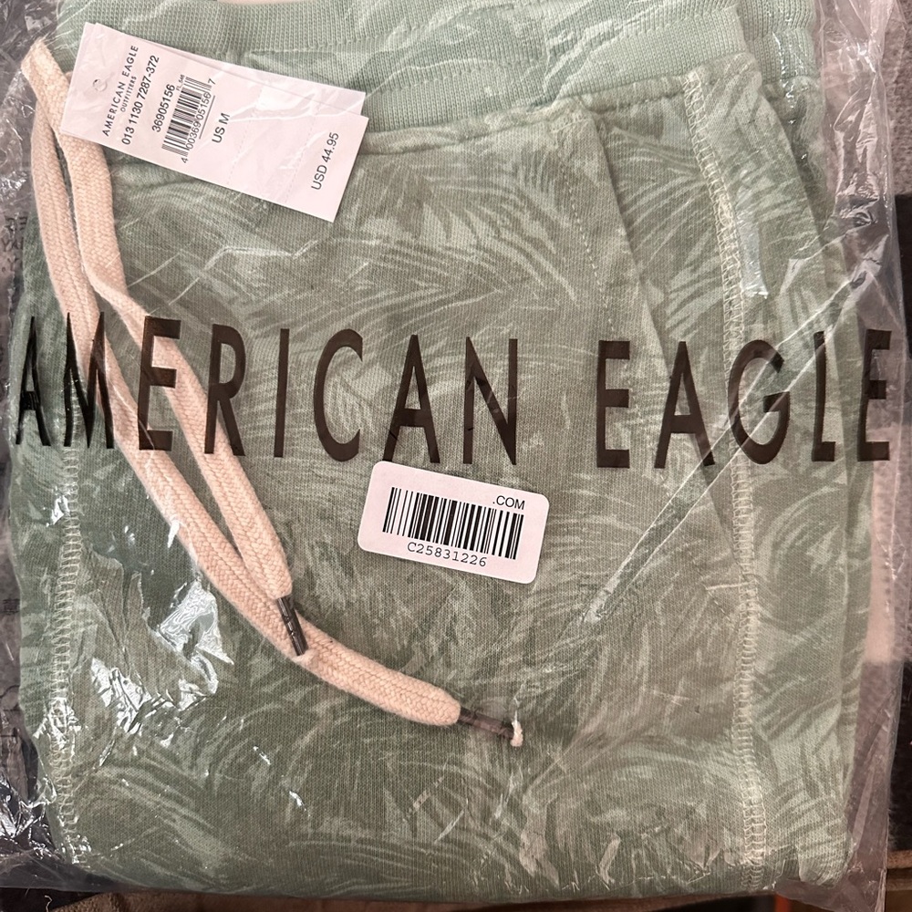 American Eagle fleece shorts palm print. Brand new in bag. Out only for photos